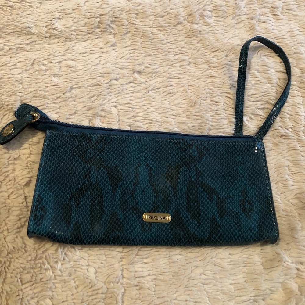 Perlina wristlet with built in wallet inside.